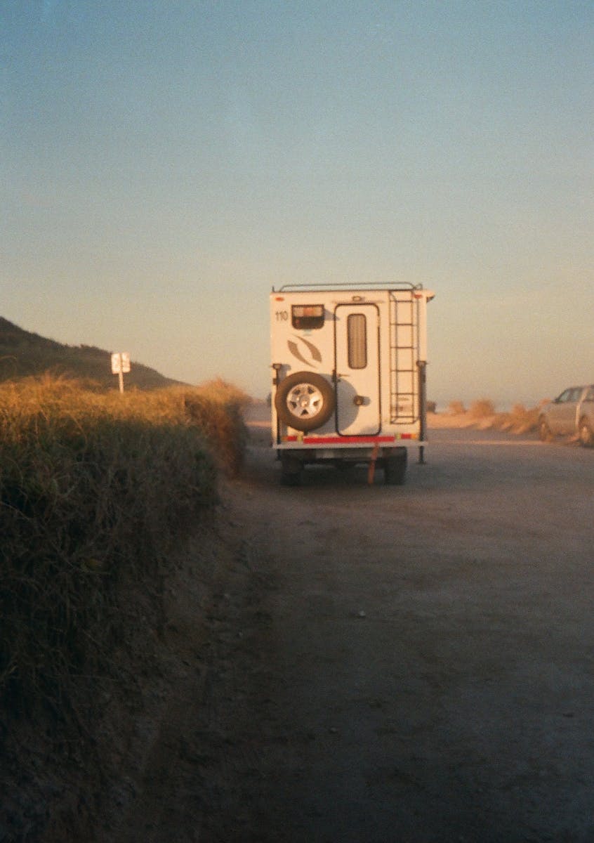 Van Parked on Dirt Road